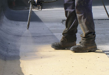 Coating systems over Glendale spray foam roof systems